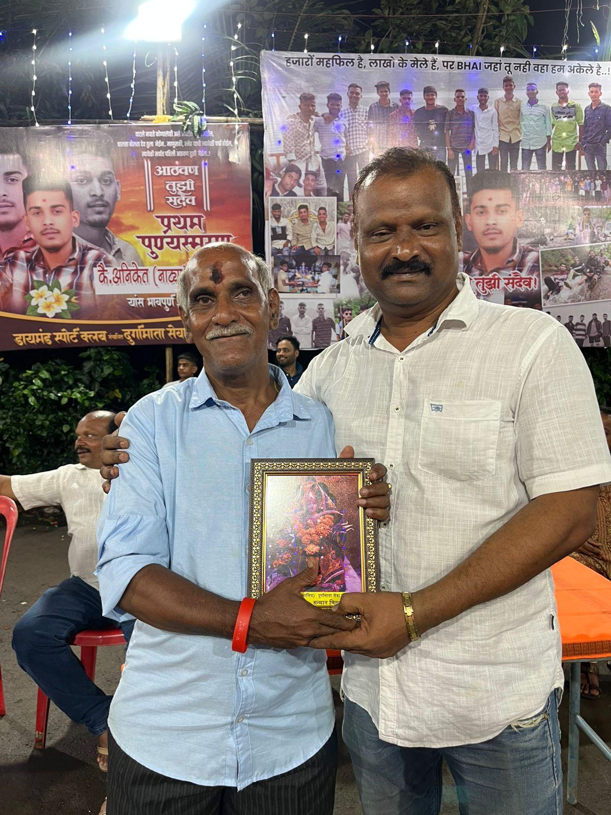 The temple idol decorated with flowers.